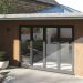 Anthracite grey bi-fold doors Lincolnshire installation - Glaze Windows And Doors